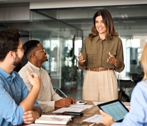 Happy,Middle,Aged,Business,Woman,Executive,Ceo,Leader,Discussing,Project