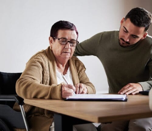 Legal,,Contract,Or,Senior,Woman,Signature,For,Disability,Compensation,,Planning